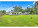 Charming single-Gathering home featuring a well-manicured lawn and a welcoming facade with a classic design at 337 Price St, Goose Creek, SC 29445
