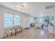 Bright living room with light wood floors, neutral paint, and modern furniture at 337 Price St, Goose Creek, SC 29445