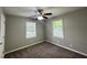 Bedroom featuring plush carpet flooring, a ceiling fan with lighting, neutral paint, and natural light at 36 Guerry Cir, Goose Creek, SC 29445