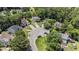 Aerial view of the home in a cul-de-sac surrounded by lush green trees and well-maintained lawns at 3813 Battleview Ct, North Charleston, SC 29420
