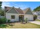Charming single-Gathering home features a well-manicured lawn, two-car garage, and inviting front entrance at 3813 Battleview Ct, North Charleston, SC 29420