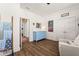 Bright bedroom with blue dresser, wood floors, and decor at 383 Oak Park St, Summerville, SC 29486