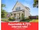 Charming two-story home with a welcoming front porch and beautifully landscaped yard at 383 Oak Park St, Summerville, SC 29486