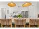 Bright, open kitchen with a large island offering barstool seating and modern appliances at 383 Oak Park St, Summerville, SC 29486