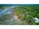 Stunning aerial view of homes along the water, complete with private docks and boat access at 392 Tombee Ct, Mount Pleasant, SC 29464