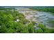 Expansive aerial view of the community waterfront, featuring winding boardwalks through the marshlands at 392 Tombee Ct, Mount Pleasant, SC 29464