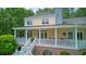 Lovely back exterior showing a large porch with a comfortable outdoor seating area at 392 Tombee Ct, Mount Pleasant, SC 29464