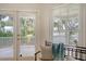 Charming balcony view overlooking a picturesque waterfront and lush greenery at 392 Tombee Ct, Mount Pleasant, SC 29464