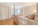 Bedroom with a four-poster bed and neutral decor at 392 Tombee Ct, Mount Pleasant, SC 29464