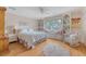 Cozy bedroom with a plush bed, built-in shelves, and a window seat at 392 Tombee Ct, Mount Pleasant, SC 29464