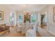 Formal dining room with a round table, classic chandelier, and inviting ambiance at 392 Tombee Ct, Mount Pleasant, SC 29464