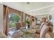Bright dining room with a large window and river views, perfect for elegant meals and entertaining guests at 392 Tombee Ct, Mount Pleasant, SC 29464