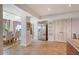 Kitchen area with stainless steel refrigerator and open flow to dining and living spaces, perfect for entertaining at 392 Tombee Ct, Mount Pleasant, SC 29464