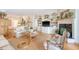 Open living room with custom built-ins, fireplace and staircase at 392 Tombee Ct, Mount Pleasant, SC 29464