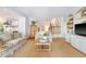 Inviting living room featuring hardwood floors and staircase access at 392 Tombee Ct, Mount Pleasant, SC 29464