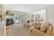 Bright and airy living room with fireplace and access to outdoor patio at 392 Tombee Ct, Mount Pleasant, SC 29464