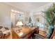 Bright office with a classic desk, open doorway to the entry hall and neutral decor at 392 Tombee Ct, Mount Pleasant, SC 29464