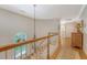 Bright staircase with a decorative window and wooden banister at 392 Tombee Ct, Mount Pleasant, SC 29464