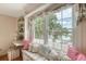 Charming window seat with decorative pillows and scenic water views at 392 Tombee Ct, Mount Pleasant, SC 29464
