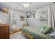 Cozy bedroom with hardwood floors and natural light streaming through the windows at 401 Amy Dr, Goose Creek, SC 29445