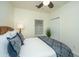 Bedroom with wicker headboard, ceiling fan, natural light and comfortable decor at 401 S Elgin Ct # 401, Charleston, SC 29414