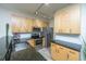 Bright kitchen featuring stainless steel appliances, wood cabinets, granite countertops, and recessed lighting at 401 S Elgin Ct # 401, Charleston, SC 29414
