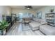 Bright living room features a comfy sectional sofa, stylish rug, and abundant natural light at 401 S Elgin Ct # 401, Charleston, SC 29414