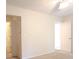 Bedroom with neutral carpet and fresh paint, with two doors leading to other rooms at 403 Sunny Side Way, Summerville, SC 29485