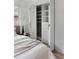 Bedroom closet with bi-fold doors, and built-in shelving at 403 Wedgewood St, Charleston, SC 29407