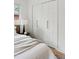 Bedroom with double closet doors, cozy lighting and hardwood floor at 403 Wedgewood St, Charleston, SC 29407