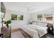 Sunlit bedroom with hardwood floors and view from the windows at 403 Wedgewood St, Charleston, SC 29407
