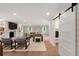 Spacious living room with fireplace, shiplap walls, and view of the backyard at 403 Wedgewood St, Charleston, SC 29407