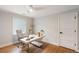 Bright office area with a modern desk, comfortable chair, and soothing natural light at 403 Wedgewood St, Charleston, SC 29407