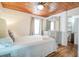 Bedroom with wood ceiling, window, dresser and bed with light blue bedding at 405 Palmetto Blvd, Edisto Island, SC 29438