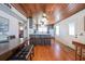 Bright, open kitchen and dining space with a wood ceiling at 405 Palmetto Blvd, Edisto Island, SC 29438