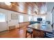 Inviting living space with a welcoming sign, bar-style dining, and comfortable seating with TV at 405 Palmetto Blvd, Edisto Island, SC 29438