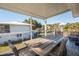 Spacious porch with seating perfect for entertaining and relaxing at 405 Palmetto Blvd, Edisto Island, SC 29438