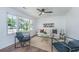Bright living room featuring hardwood floors, ceiling fan, and neutral decor at 4233 Oakridge Dr, North Charleston, SC 29418