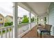 Charming balcony with views of the street and surrounding homes at 4953 W Liberty Park Cir, North Charleston, SC 29405