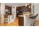 Kitchen with granite countertops, stainless steel appliances, and a center island with breakfast bar at 4953 W Liberty Park Cir, North Charleston, SC 29405