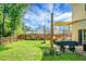The expansive backyard features a patio, fire pit, and a lush, green landscape at 508 Glady Rd, Moncks Corner, SC 29461