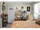 Comfortable bedroom with floral bedding, classic furniture, and personal touches at 508 Glady Rd, Moncks Corner, SC 29461