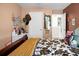 Bedroom with a decorative bed, large window, and unique decor elements at 508 Glady Rd, Moncks Corner, SC 29461