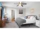 Contemporary bedroom with a black metal bed frame and neutral gray walls at 508 Glady Rd, Moncks Corner, SC 29461