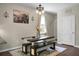 Bright dining room features a farmhouse table with bench seating, perfect for Gathering gatherings at 508 Glady Rd, Moncks Corner, SC 29461