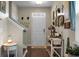 Charming entryway with decorative elements, a staircase, and a white front door at 508 Glady Rd, Moncks Corner, SC 29461