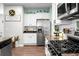 Charming kitchen featuring stainless steel appliances, granite countertops, and stylish white cabinets at 508 Glady Rd, Moncks Corner, SC 29461