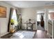 Cozy, sunlit room featuring hardwood floors, decorative accents, and view into the next room at 508 Glady Rd, Moncks Corner, SC 29461