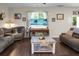 Cozy living room with comfortable seating, a stylish coffee table, and a flat-screen TV at 508 Glady Rd, Moncks Corner, SC 29461
