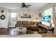 Inviting living room featuring hardwood floors, comfortable seating, and a ceiling fan for added comfort at 508 Glady Rd, Moncks Corner, SC 29461